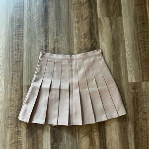 Tan pleated mini skirt
